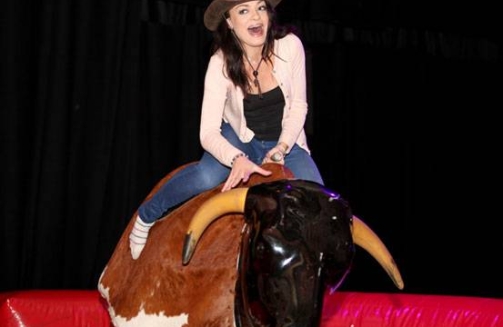 Lady on rodeo bull'
